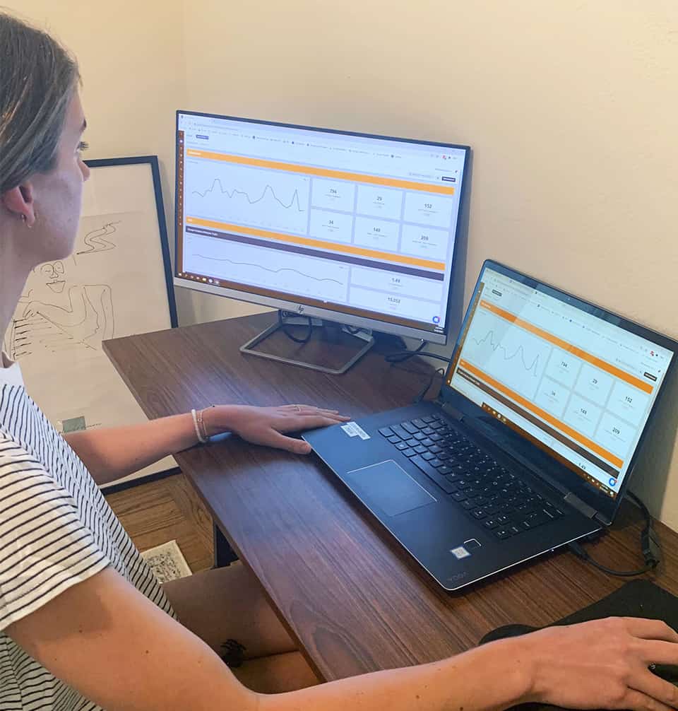 seo-how-measure-seo-success_2 woman reviewing google analytics for ads